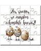 Puzzle con la frase "Los sueños se cumplen echándole huevos" en lata